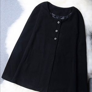 Black cape sleeve pocket crew neck solid